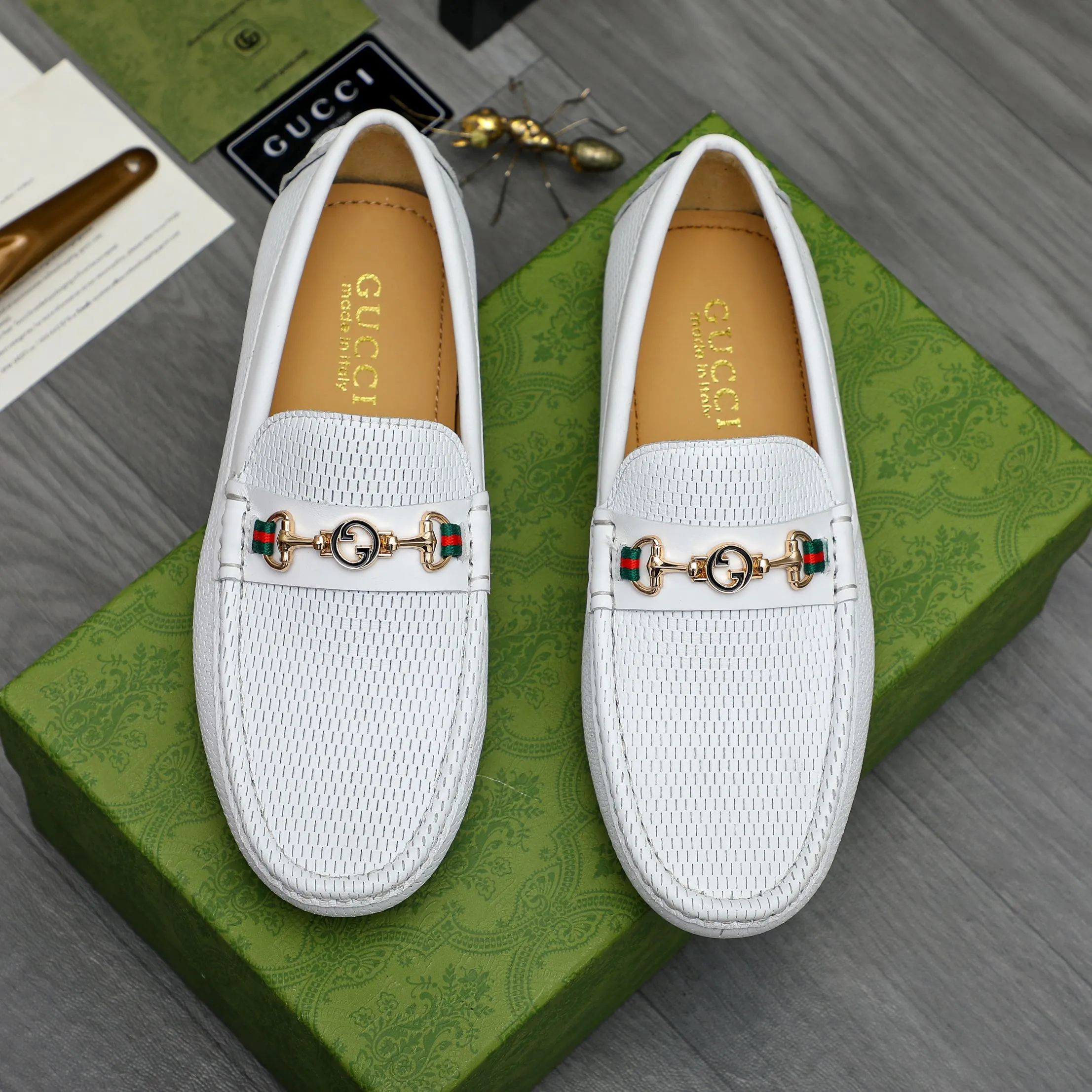 P420 Product trademark: GUCCI (Gucci) casual slip-on men's shoes Regular size: 38-44 Product materials: Selected hollow cowhide upper, sheepskin lining, original rubber outsole